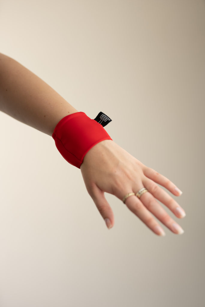 A wrist with a wrist support band